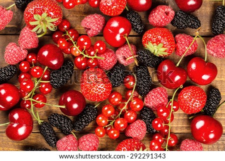 Collection of cherries, strawberries, mulberries, red currants, raspberries for background