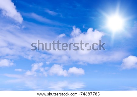 Marine landscape with a cloudy sky and bright sun