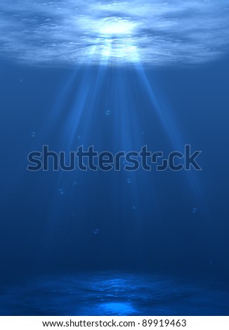 the ocean floor with bubbles of air and bright sunlight