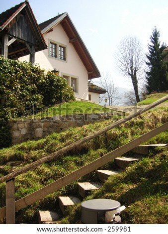 Stairs and a house in the Gruyere region of Switzerland