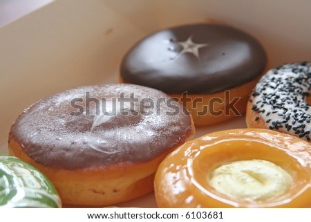 Assorted variety of donuts in a box