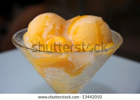 Shaved ice dessert with fruits and icecream
