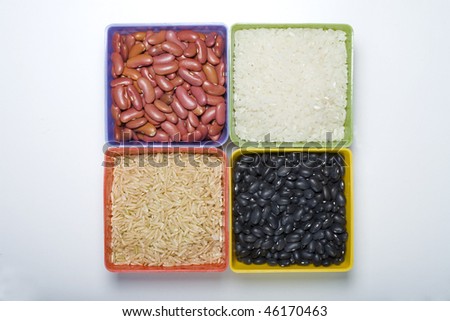 Assorted rice and beans displayed.