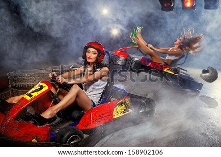 girl is driving Go-kart with speed in Carting