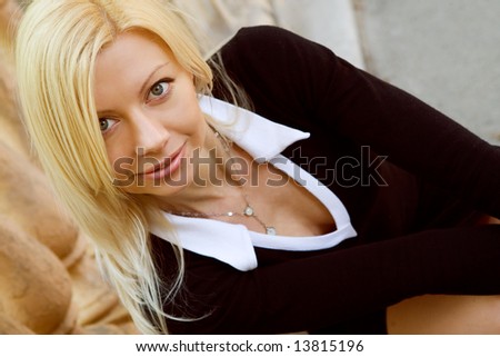 Happy natural blond woman portrait