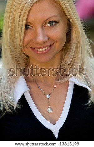 Happy natural blond woman portrait