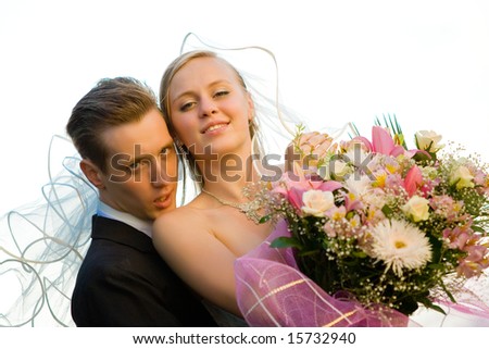 Colorful wedding scene with beautiful bride and groom