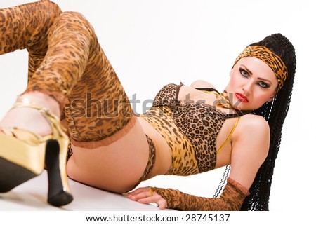 Sweet caucasian model wearing erotic lingerie set over white