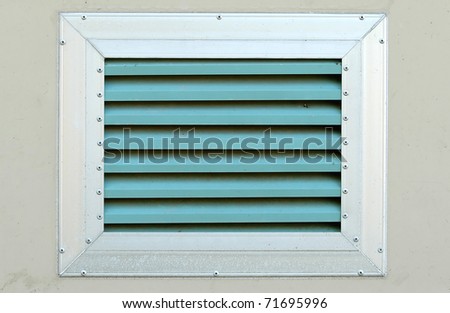 An industrial ventilation attached to a building