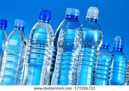 Composition with assorted plastic bottles of mineral water