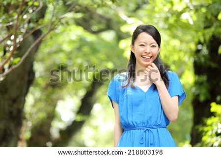 beautiful asian women in the forest