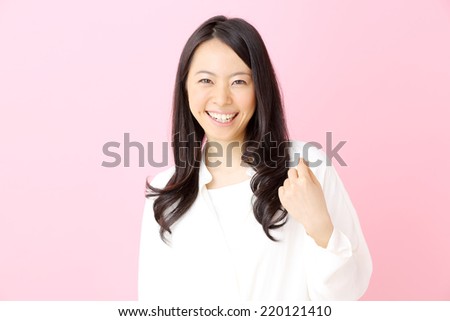 Woman fist pumped celebrating success