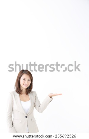 Asian corporate officer with finger point out