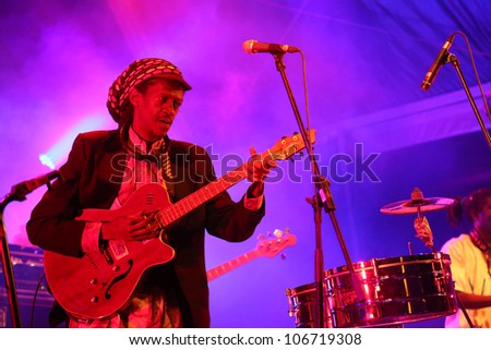 LOULE, PORTUGAL - JUNE 29: Cheikh LÃ?Â´ performs onstage in a world music festival at festival med on June 29, 2012 in Loule, Portugal.