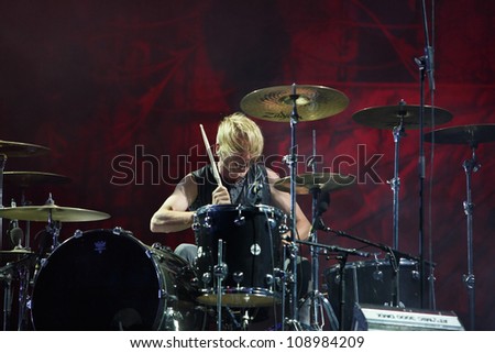 FARO, PORTUGAL - JULY 20: Apocalyptica performs onstage at the International Motorcycle Meeting JULY 20, 2012 in Faro, Portugal.