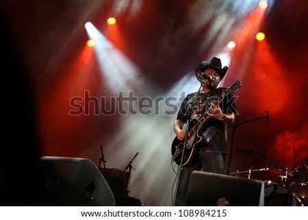 FARO, PORTUGAL - JULY 21: Rebeldes performs onstage at the International Motorcycle Meeting JULY 21, 2012 in Faro, Portugal.