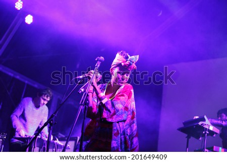 LOULE - JUNE 26: Bomba Estereo an eletronic dance music band from Colombia, performs on stage at festival med, a world music festival, in Loule, Portugal, June 26, 2014