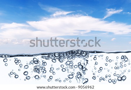 water bubbles isolated against blue sky