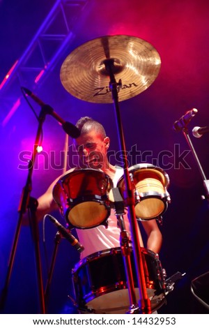 LOULE, PORTUGAL - JUNE 25: Balkan Beat Box lead singer playing drum performs onstage at Festival Med June 25, 2008 in Loule, Portugal.