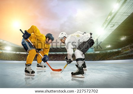 Ice hockey player on the ice. Open stadium - Winter Classic game.