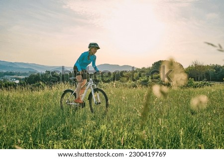 Similar – Foto Bild Junge Frau mit Radoutfit