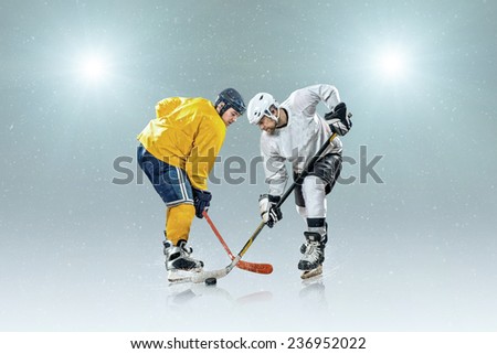 Ice hockey player on the ice and light effects