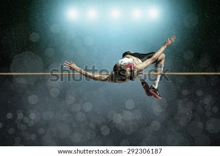 Athlete in action of high jump. Foto d'archivio © 