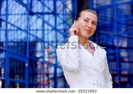 Business women in white on business architecture background