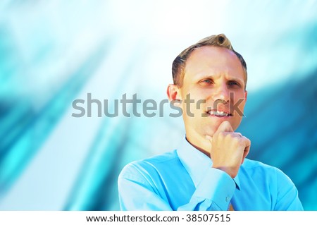 Happiness businessman on blur business architecture background