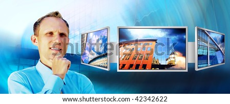 Happiness businessman in the business studio with monitors