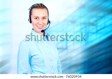 Happiness businesswoman speak in headphones on blur business architecture background