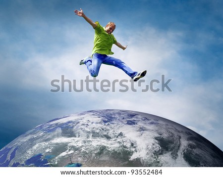 Fun couple in jump over the Planet Earth