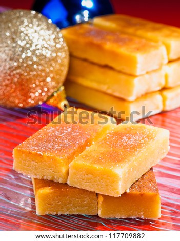 marzipan bars in tray, with Christmas decorations