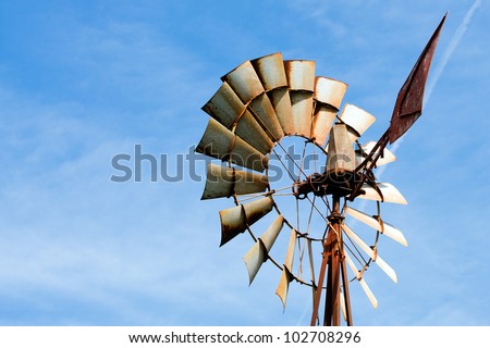 Old rusty windmill at rural farm
