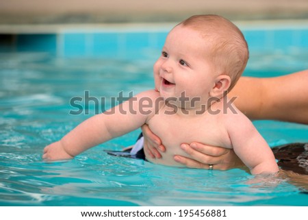 Similar – Image, Stock Photo Funny boy swimming underwater looking at camera
