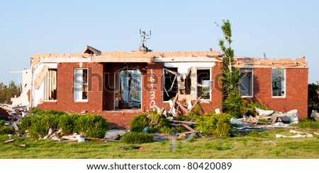 Tornado-damaged home in northern Alabama one month after storm.