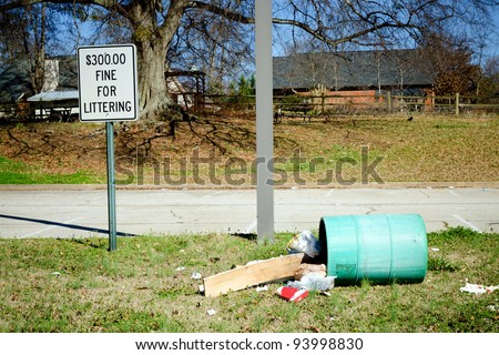 Litter in barrel turned over next to \