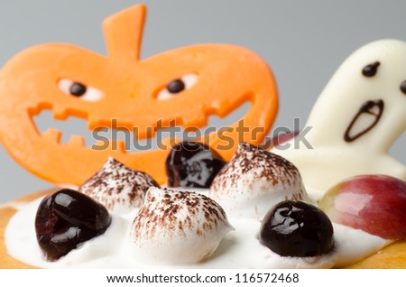 Halloween cake with pumpkin background