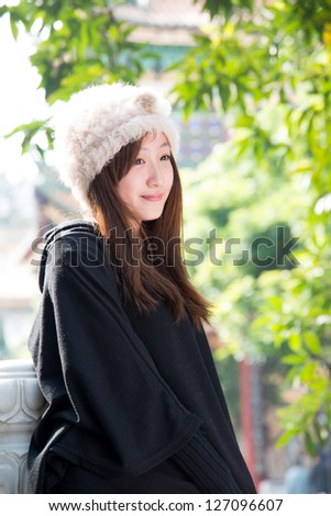beauty girl in Chinese style garden outdoor