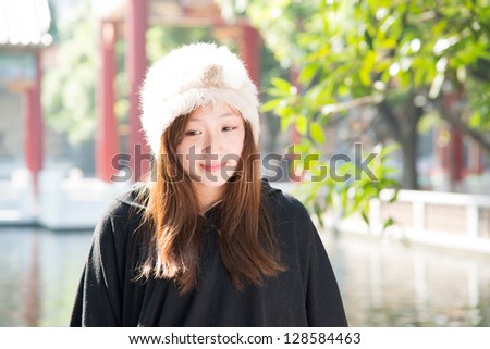 beauty girl in Chinese style garden outdoor
