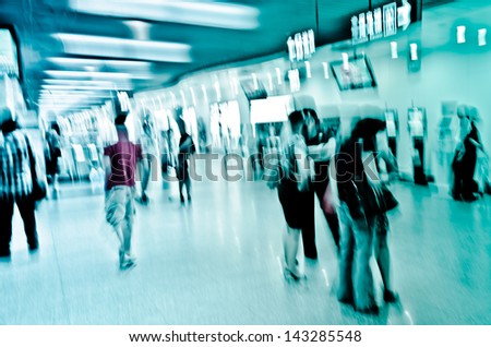 Business passenger crowd at subway station motion blurred abstract