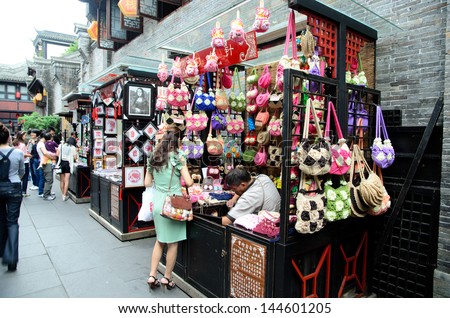 CHENGDU, CHINA-SEP 08: Shopper and stores at Jinli retro Pedestrian Street,Jinli Street is one of the most famous street of China where full of retro Chinese element. On SEP 08, 2011 in CHENGDU.