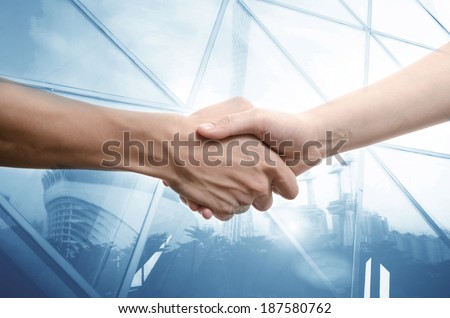 business man and woman shaking hands, isolated on white