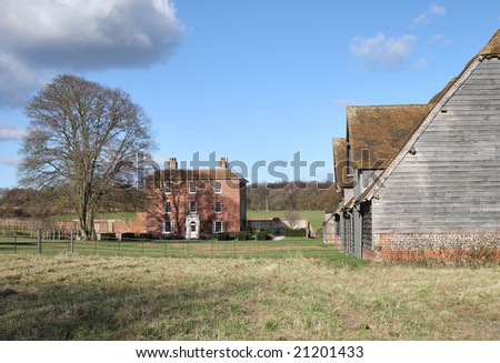 A Farm and Out Buildings in Rural England in late Autumn Sunshine