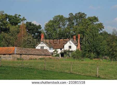 Traditional Wooden Framed English Rural House and garden