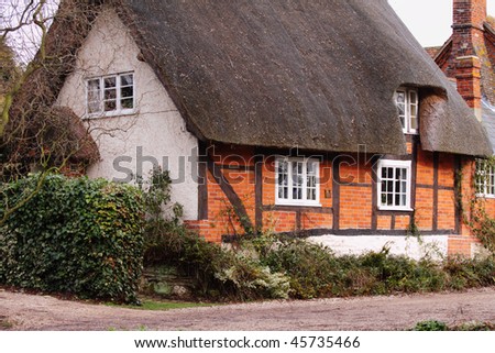 Traditional English Timber Framed Thatched Village Cottage