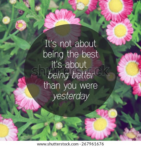 Inspirational quote on pink blossom flowers with retro filter effect