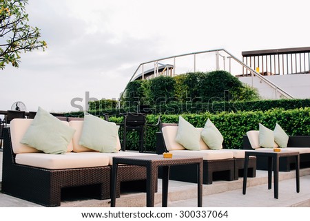 BANGKOK, THAILAND, JULY 25, 2015: Restaurant couch bar with view of Bangkok Cityscape at the Three Sixty  Lounge of Millennium Hilton Bangkok Hotel in Bangkok, Thailand.