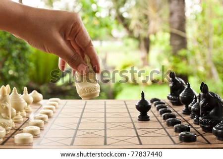 Playing chess game. defeating the opposite team.
