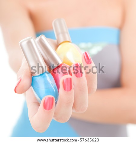 Elegant woman choose the color of nail polish
